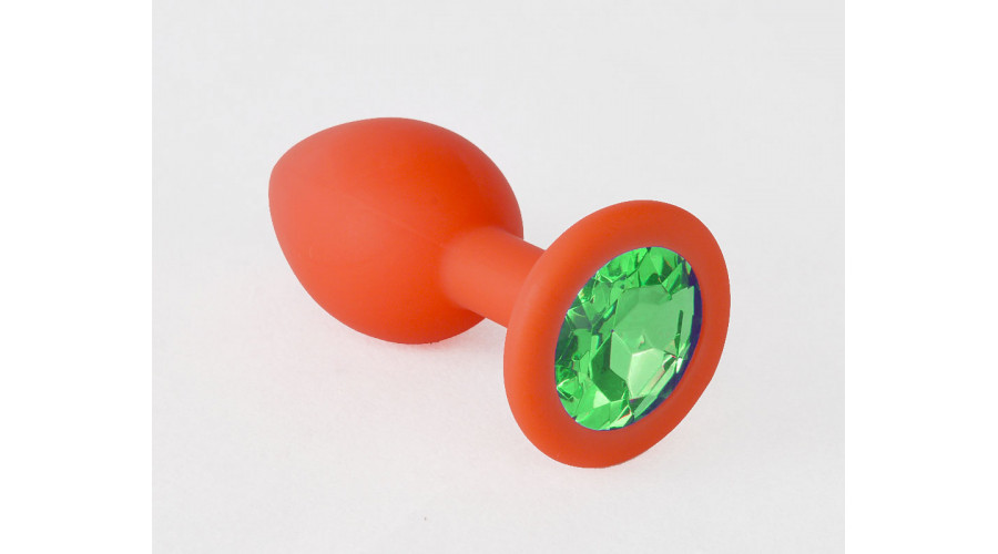 Анальная пробка красная, цвет кристалла зеленый, силикон Ø35