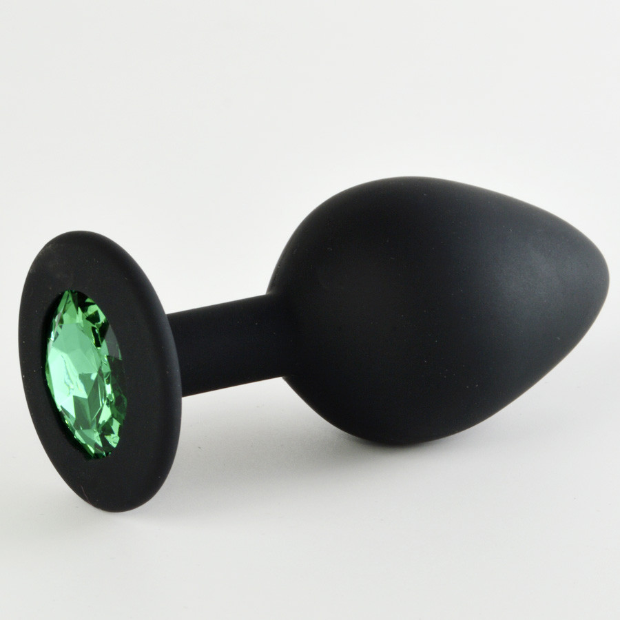 Анальная пробка черная, цвет кристалла зеленый, силикон Ø35